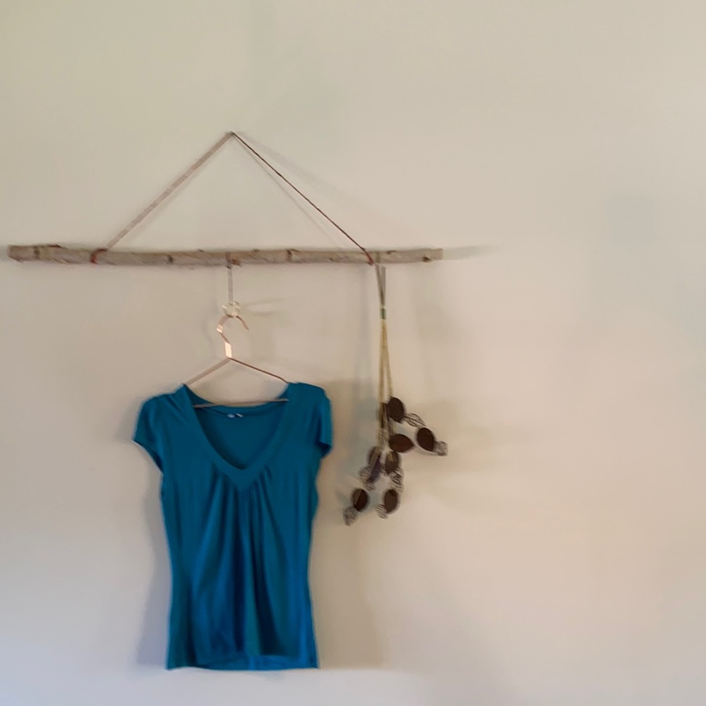 Teal classic short sleeved top.